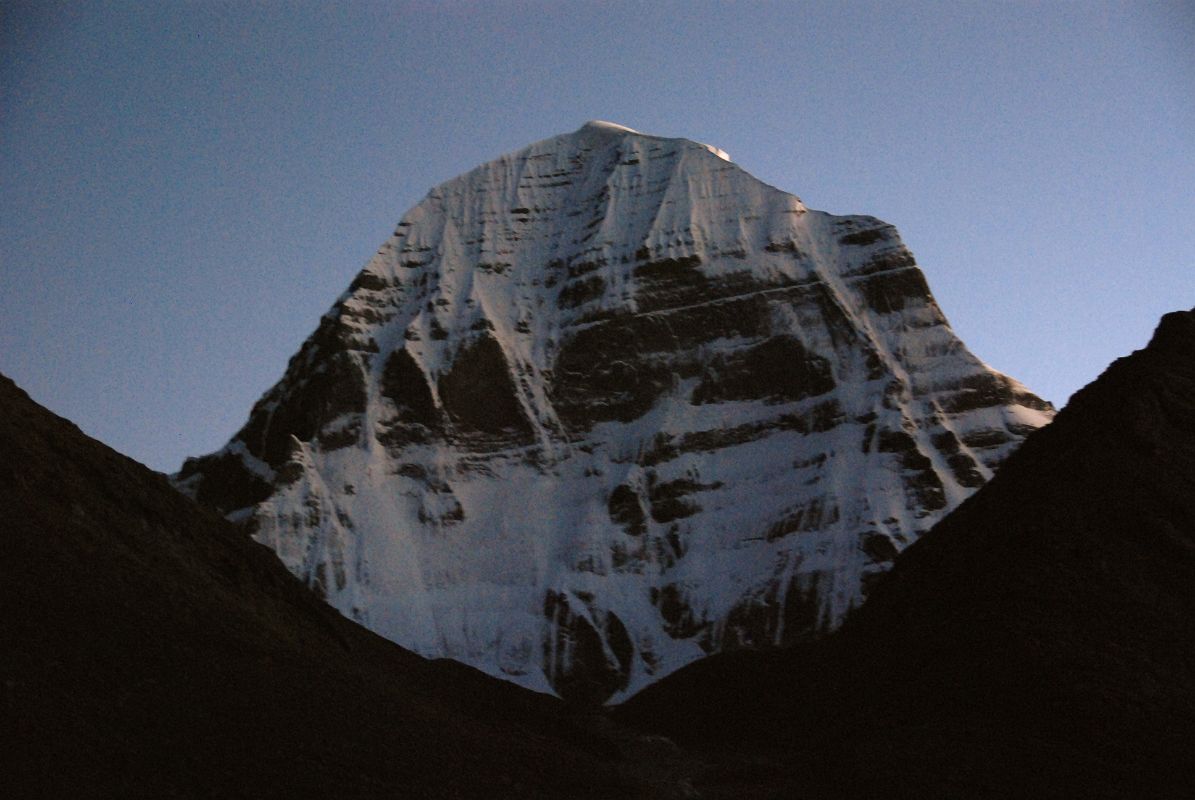 38 Mount Kailash North Face At Sunset On Mount Kailash Outer Kora In October the setting sun doesn�t shine on Mount Kailash North Face. When I was here in July 2006, the sun did illuminate the face at sunset.